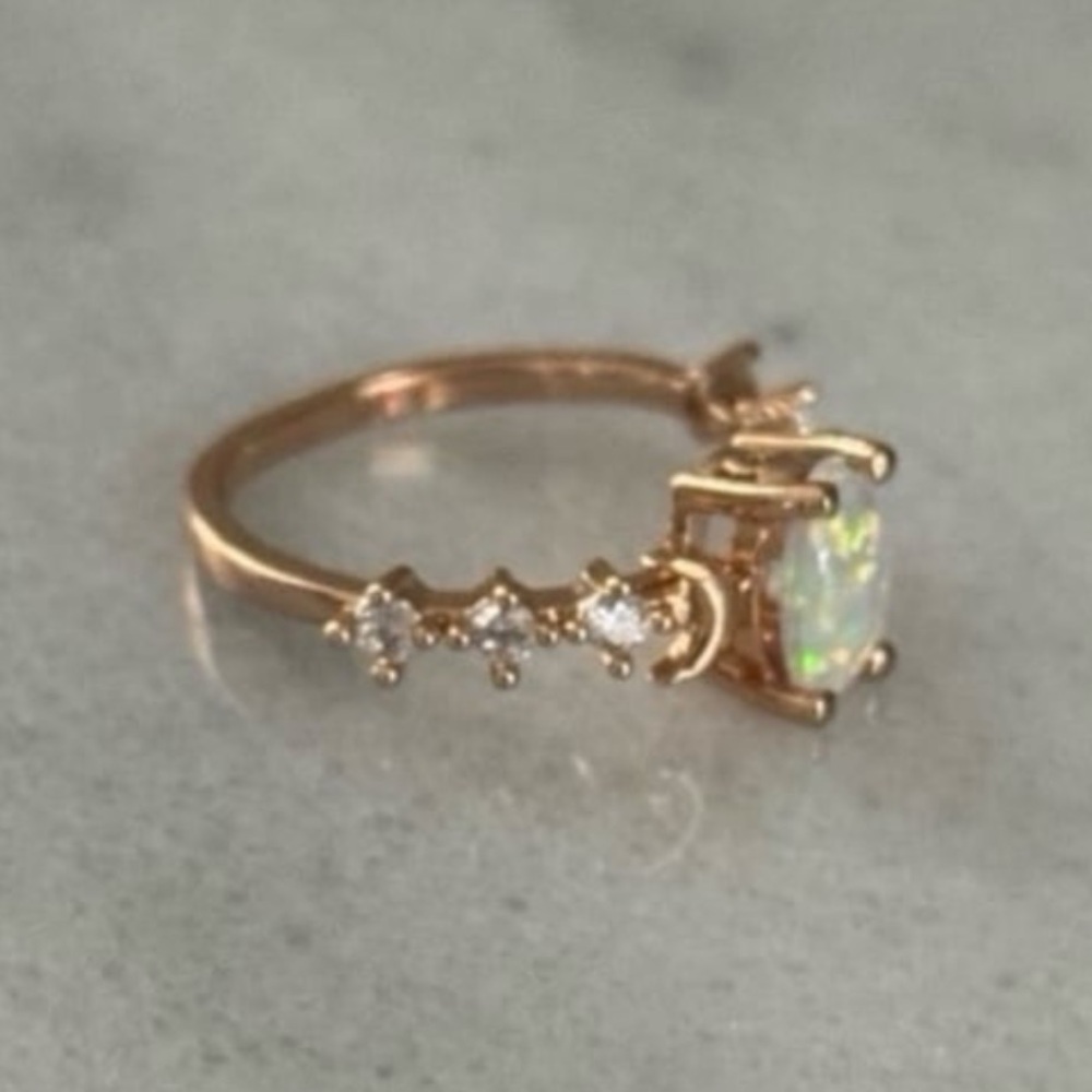 Rose Gold Opal Moon Crystal Ring Size 7 Brand New

Brand New - Picture 6 of 6